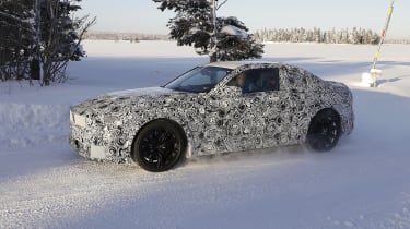 2022 BMW M2 spy shot side front snow