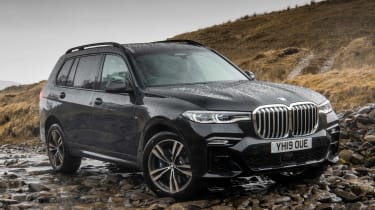 BMW X7 SUV front 3/4 off-road static