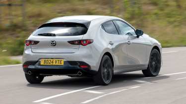 Mazda3 cornering rear quarter