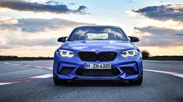 BMW M2 CS driving - front end view