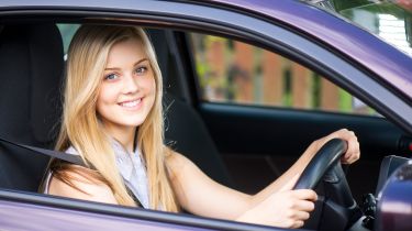 young driver in car