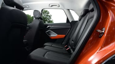 Orange Audi Q3 rear seats