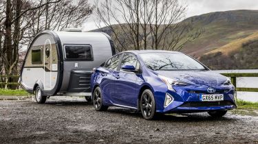 Toyota Prius towing a caravan