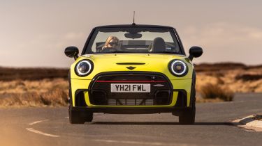 2021 MINI Convertible driving with roof down - front end