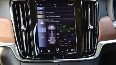 The dashboard is dominated by a large central infotainment touchscreen