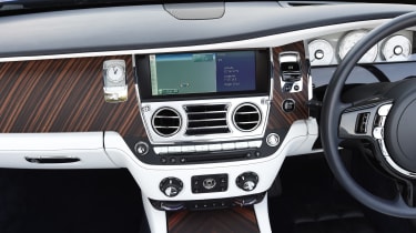 Optional features include a television tuner, 16-speaker stereo system, a head-up display and night vision technology