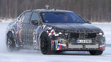 BMW M3 electric spy shot front quarter