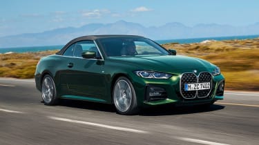 2020 BMW 4 Series Convertible driving with roof up
