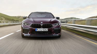 BMW M8 Gran Coupe driving - front end view