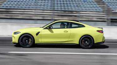 2021 BMW M4 Competition Coupe - side view dynamic 