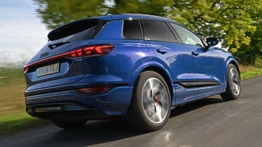 Audi Q6 e-tron rear quarter driving