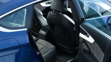 If you often carry passengers, the improved access and rear headroom of the Sportback easily beats the Coupe
