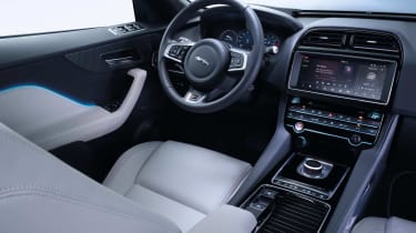 The interior cocoons the driver for a sporty feel