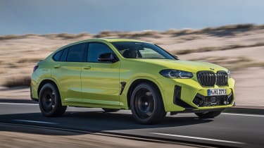 2021 BMW X4 M front 3/4 dynamic 