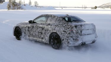 2022 BMW M2 spy shot rear corner snow