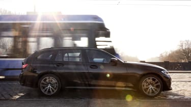 2020 BMW 330e Touring - side view dynamic 