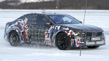 BMW M3 electric spy shot front quarter