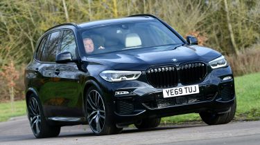 BMW X5 xDrive45e SUV front 3/4 cornering