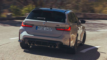 BMW M3 Touring driving - rear view