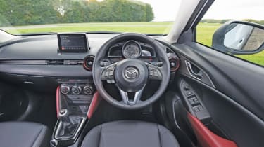 Inside the CX-3 the dashboard is smart and modern, with all models well equipped