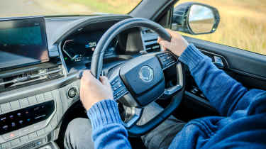 KGM Rexton steering wheel hands