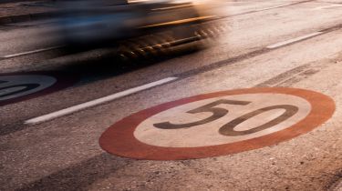 50 mph limit sign