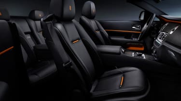 Black leather contrasts with orange highlights to evoke a sunrise