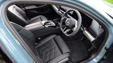 BMW i5 Touring interior side