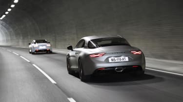 Alpine A110S models driving through tunnel