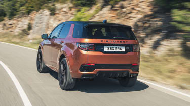 2020 Land Rover Discovery Sport Black - driving rear view
