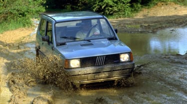 MK1 Fiat Panda 4x4 driving through mud