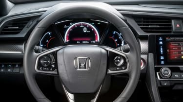The new Honda Civic&#039;s instrument cluster is dominated by a central TFT screen