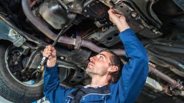 car mechanic exhaust