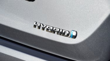 Toyota Corolla saloon hybrid badge