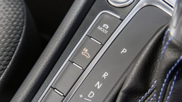 The gear selector looks like a conventional automatic, but offers a number of additional modes