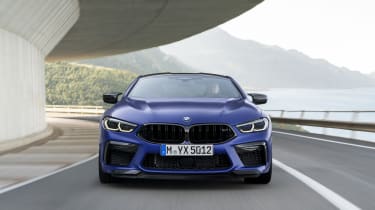 BMW M8 Competition coupe - front view driving 