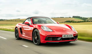 Porsche 718 Boxster convertible front 3/4 tracking