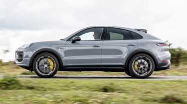 Porsche Cayenne Coupe Turbo E-Hybrid side profile driving