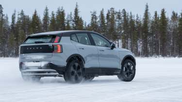 Volvo EX30 Cross Country driving rear quarter