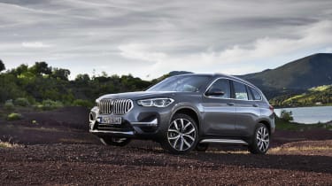 2019 BMW X1 SUV - front 3/4 wide angled off-road
