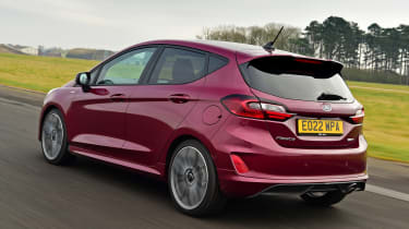 Facelifted Ford Fiesta driving - rear view