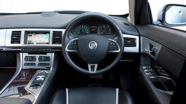 The XF’s interior is distinctive &amp; has some neat design touches, while its heated seats are some of the most powerful around
