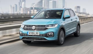 Turquoise VW T-Cross driving