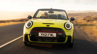 2021 MINI Convertible driving with roof down - front end