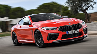 BMW M8 Competition coupe front cornering on track