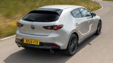 Mazda3 rear quarter driving