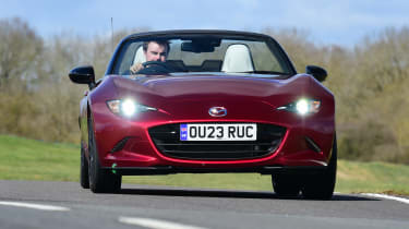 Mazda MX-5 roadster front driving
