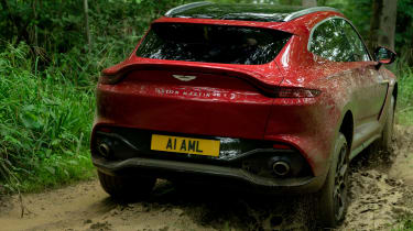 Aston Martin DBX SUV off-road mud rear