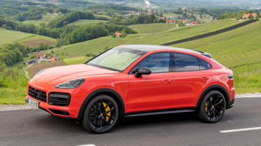 Porsche Cayenne Coupe SUV side driving