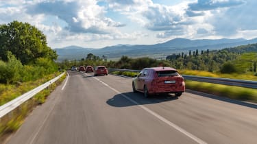 2020 Skoda Octavia Estates driving in camouflage - rear view
